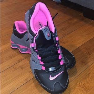 Black pink and grey Nike shox.